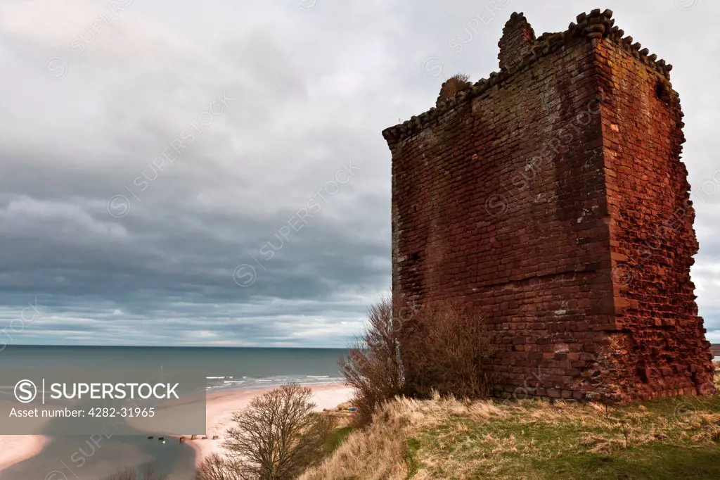 Scotland, Angus, Lunan Bay. A view of the Red Castle at Lunan in Angus.
