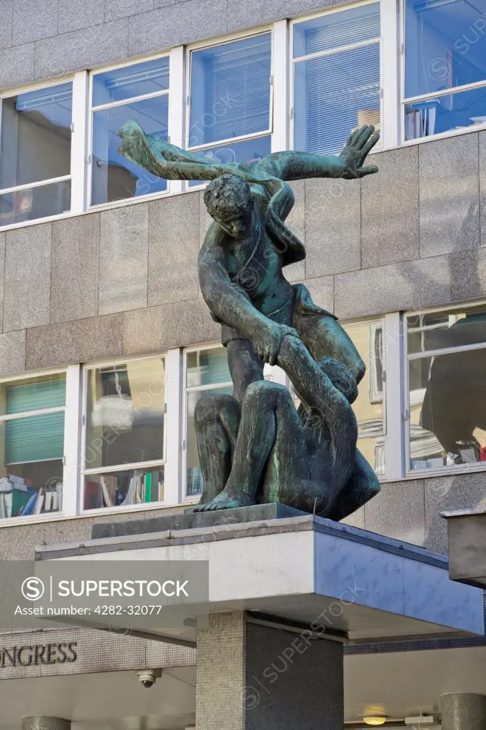 England, London, Bloomsbury. The Spirit of Brotherhood Statue stands above the entrance to the British Trades Union's Congress House.