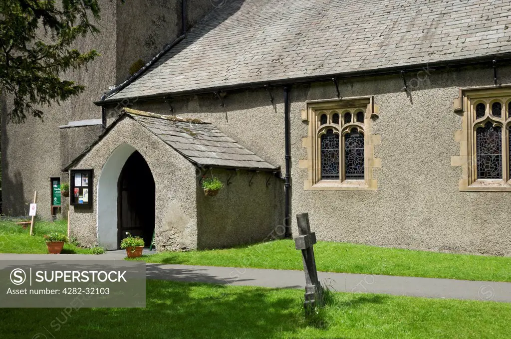 England, Cumbria, Grasmere. Entrance to St Oswald's Church where William and Mary Wordsworth's gravestones are to be found.