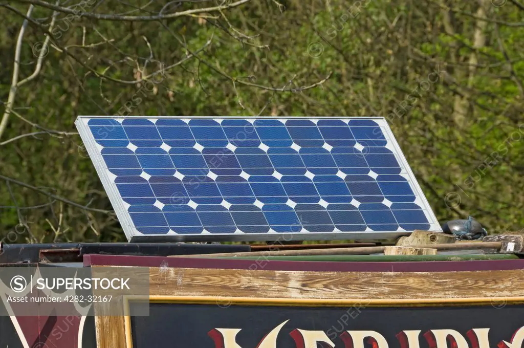 England, North Yorkshire, Skipton. A solar panel on board a narrow boat.