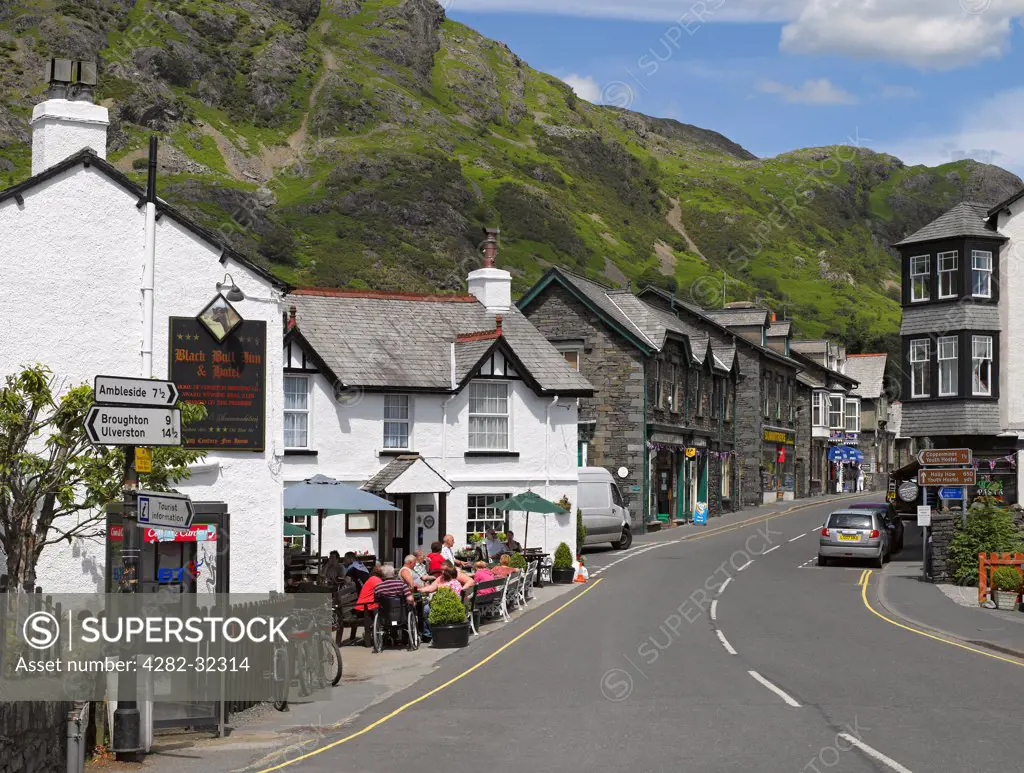 England, Cumbria, Coniston. A view along a street in Coniston.