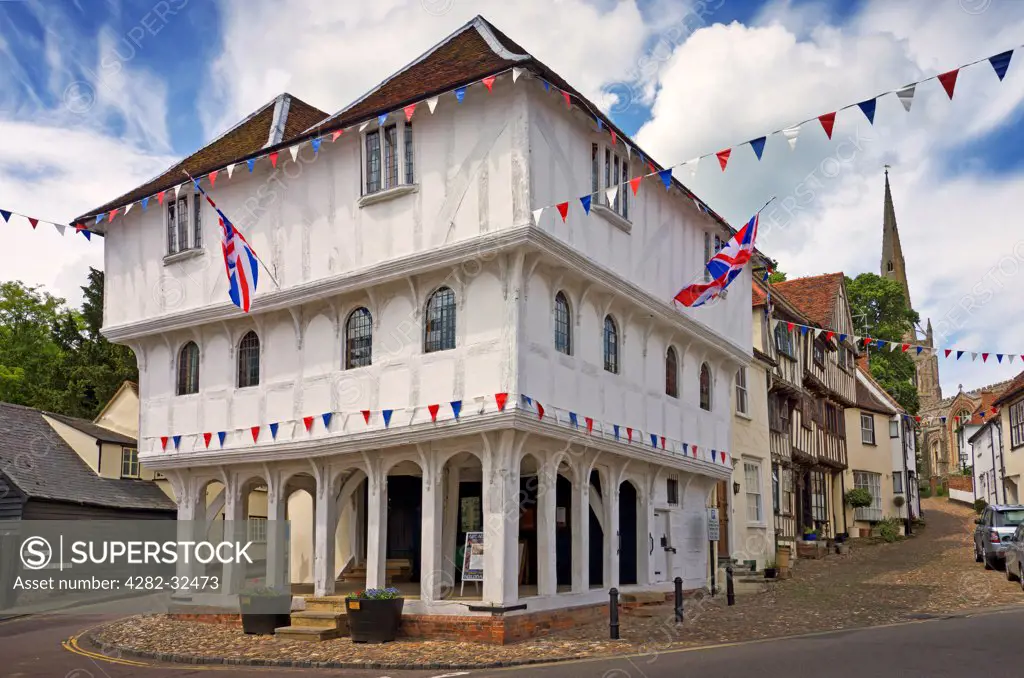 England, Essex, Thaxted. The 15th Century Guildhall in Thaxted decorated with bunting.
