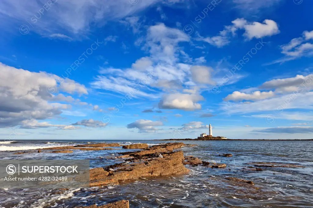 England, Northumbria, Whitley Bay. St Mary's Lighthouse near Whitley Bay in Northumberland at sunrise.