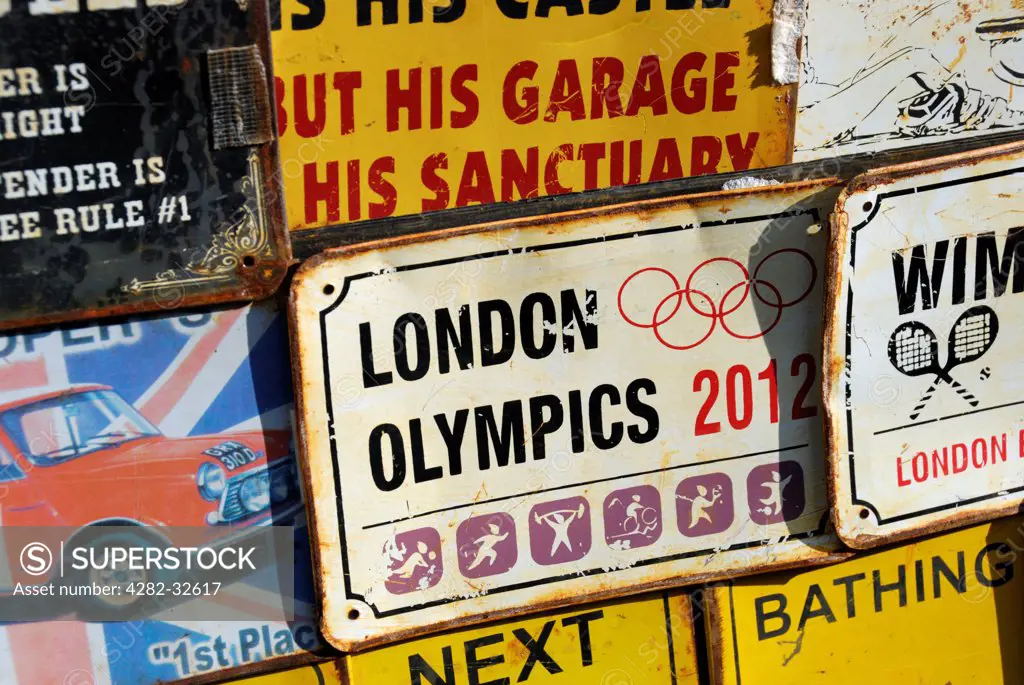 England, London, Portobello Road. London Olympics 2012 vintage style rusty tin sign for sale in Portobello market.