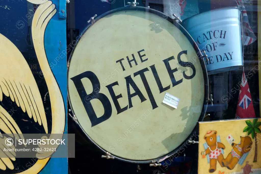 England, London, Portobello Road. A Beatles drum in an antiques shop.