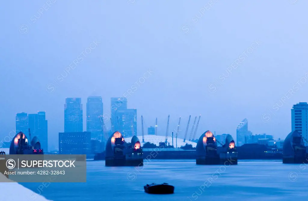 England, London, Thames Barrier. Canary Wharf and the Thames Barrier.