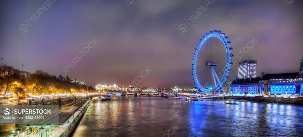 England, Westminster, London. The London Eye at night.