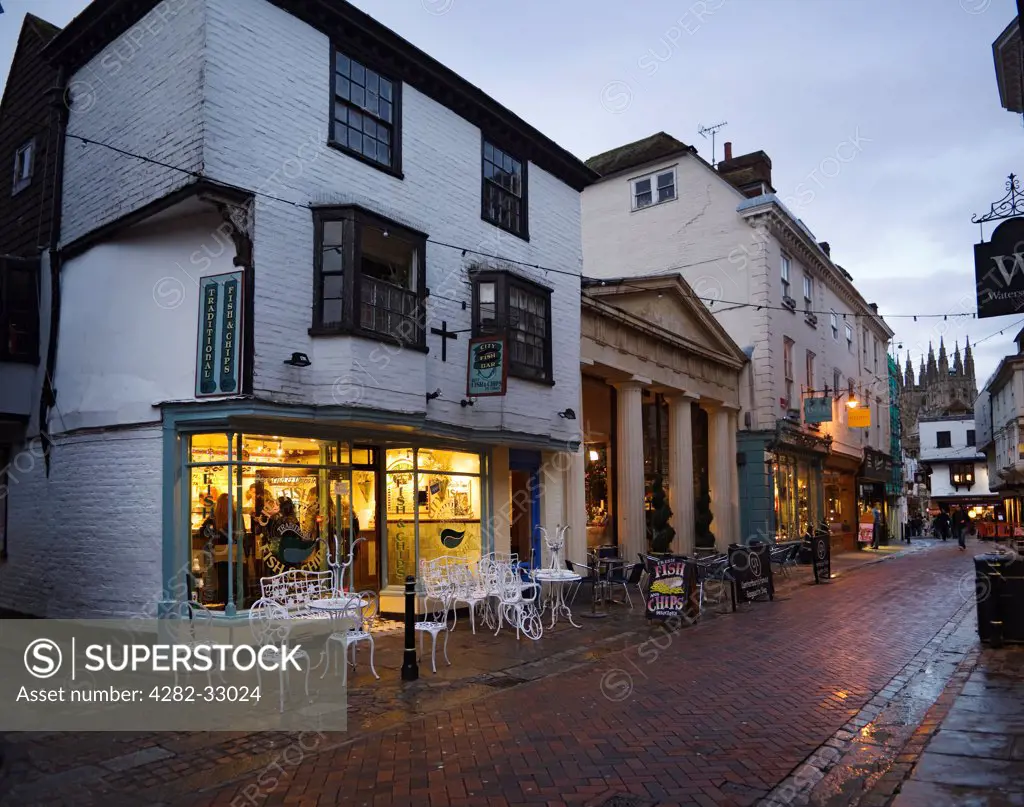 England, Kent, Canterbury. View of City Fish Bar on St Margarets Street in Canterbury in the evening.