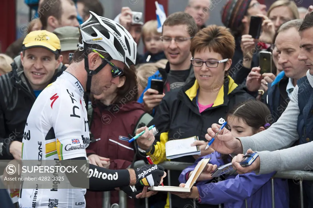 Scotland, Scottish Borders, Peebles. Mark Cavendish of Team HTC Highroad signing autographs at the start of stage one of the 2011 Tour of Britain.