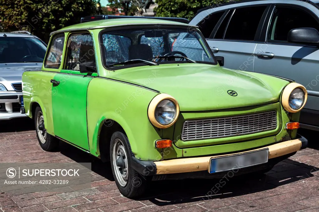 Poland, Mazovia Province, Warsaw. An old green Trabant 601S a car made in East Germany in the Socialist era and now a classic.
