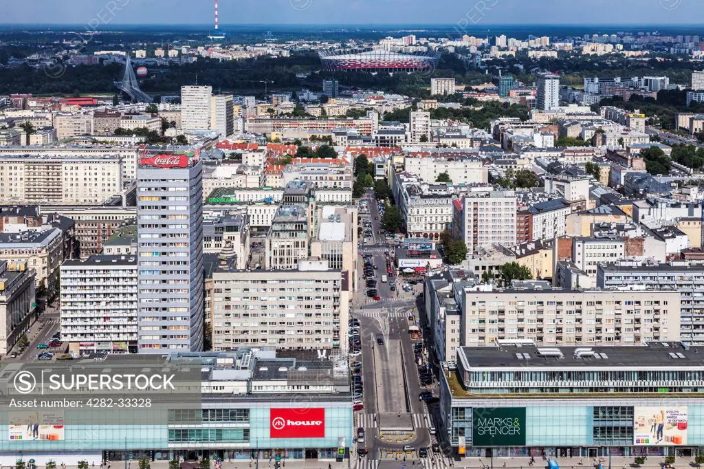 Poland, Mazovia Province, Warsaw. View of central Warsaw from the Palace of Culture and Science with Marszalkowska Street and the National Stadium.