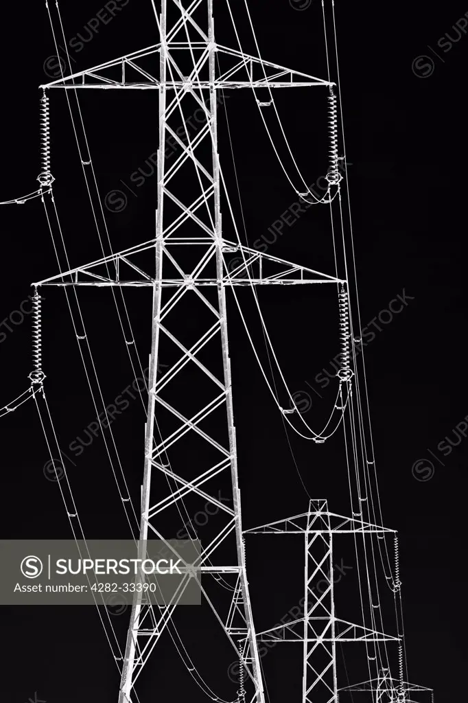 England, Leicestershire, Barlestone. Grapic abstract image of a line of pylons in Leicestershire.