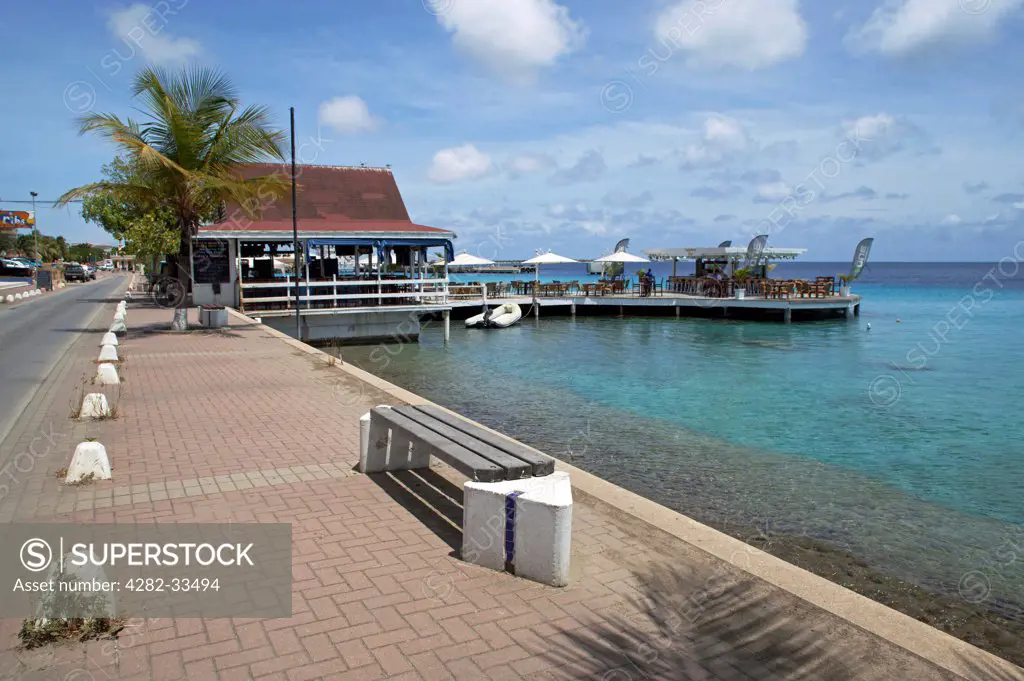 Bonaire, West Coast, Kralendijk. The view along the waterfront in Kralendijk towards Karels Bar.