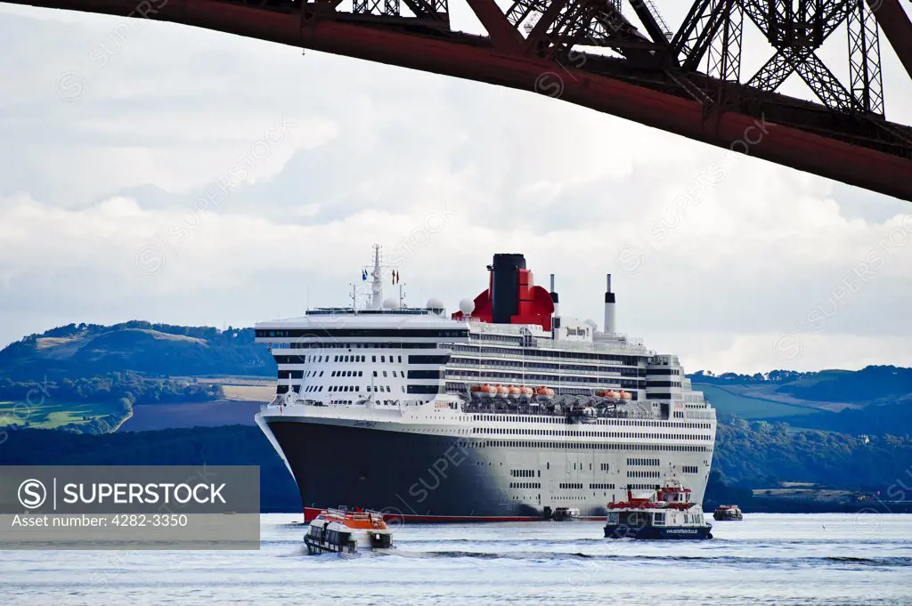 Scotland, City of Edinburgh, South Queensferry. The Cunard cruise liner Queen Mary 2 anchored off South Queensferry in the River Forth.