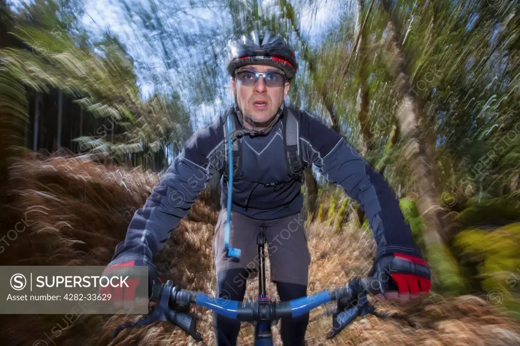 Wales, Monmouthshire, Monmouth. Male mountain biker.