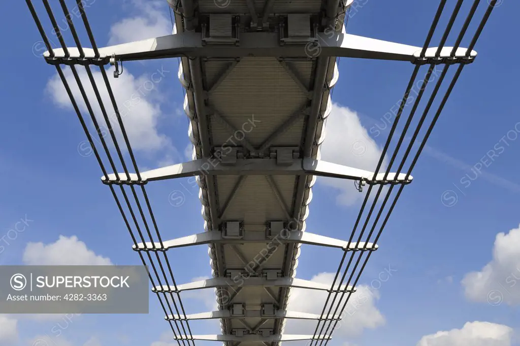 England, London, London. The underside of the Millennium bridge which connects St. Pauls Cathedral in the City of London to Bankside over the River Thames.