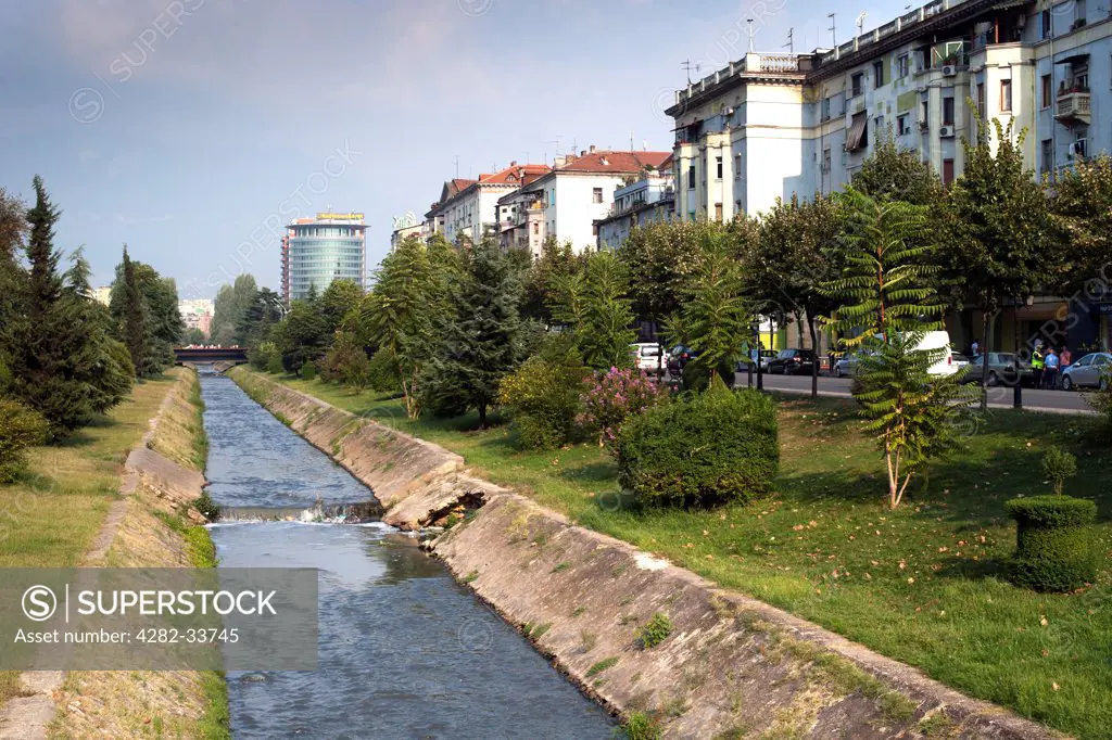 Albania, Tirana County, Tirana. The Lana River in Tirana.