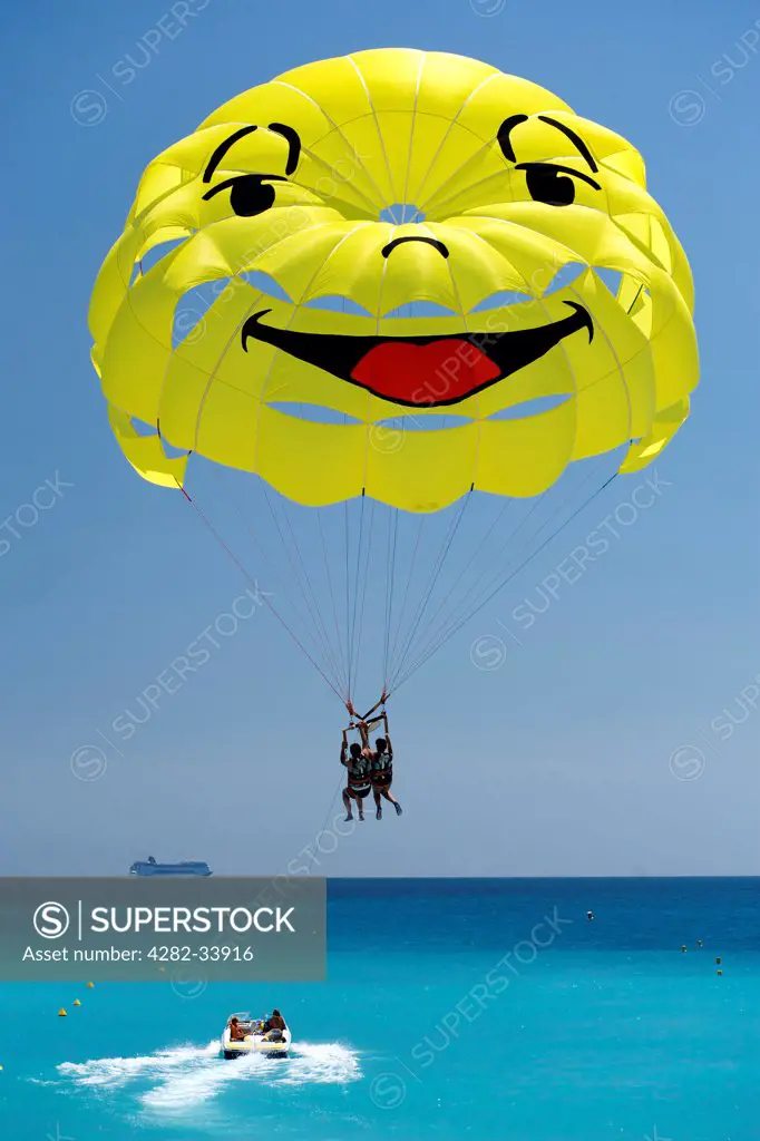 France, Provence Alpes Cote dAzur , Nice. Smiley faced parasail in the Baie des Anges.