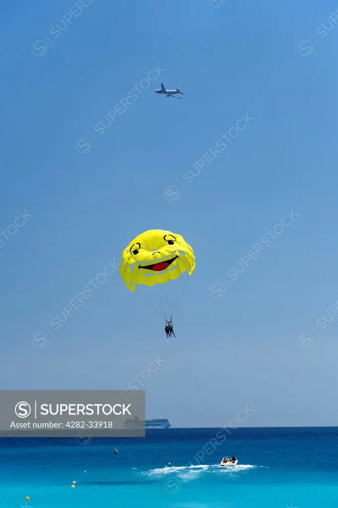 France, Provence Alpes Cote dAzur , Nice. Smiley faced parasail in the Baie des Anges.