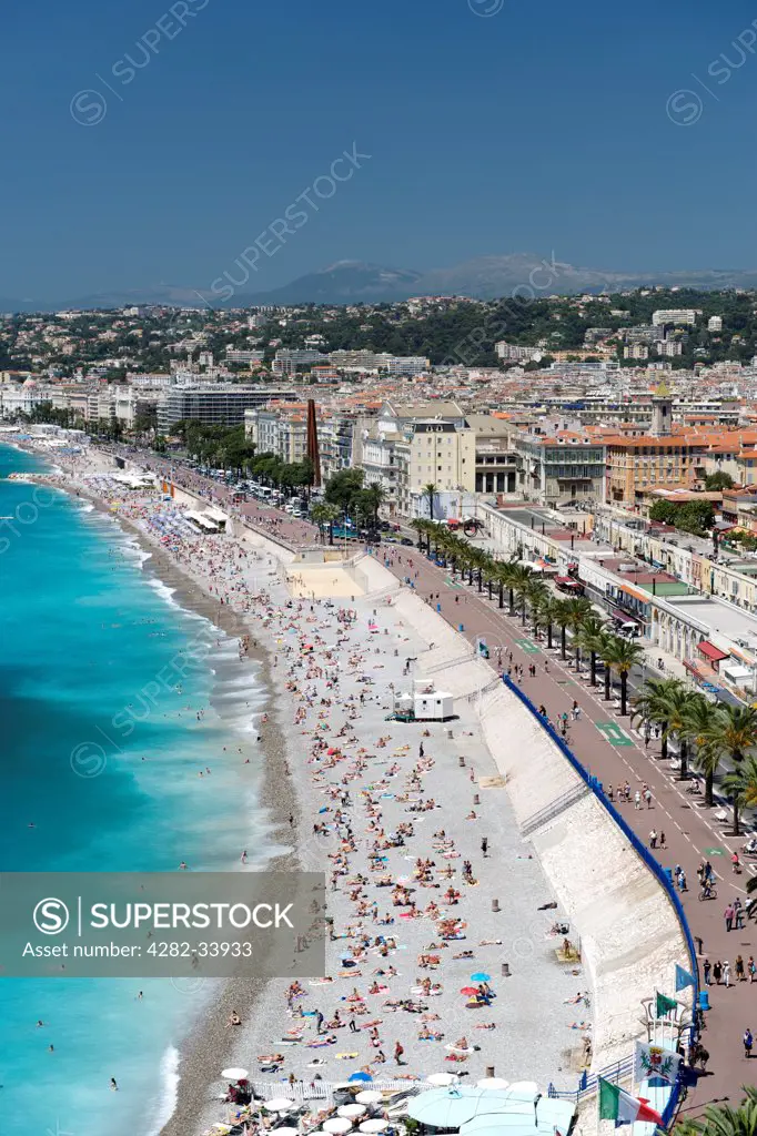 France, Provence Alpes Cote dAzur , Nice. The beach and seafront of the Baie des Anges in Nice.