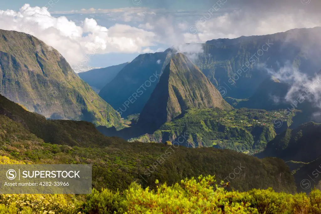 France, Reunion Island, Cirque de Mafate. A view of the Cirque de Mafate caldera and the Piton Cabri peak on the French island of Reunion in the Indian Ocean.