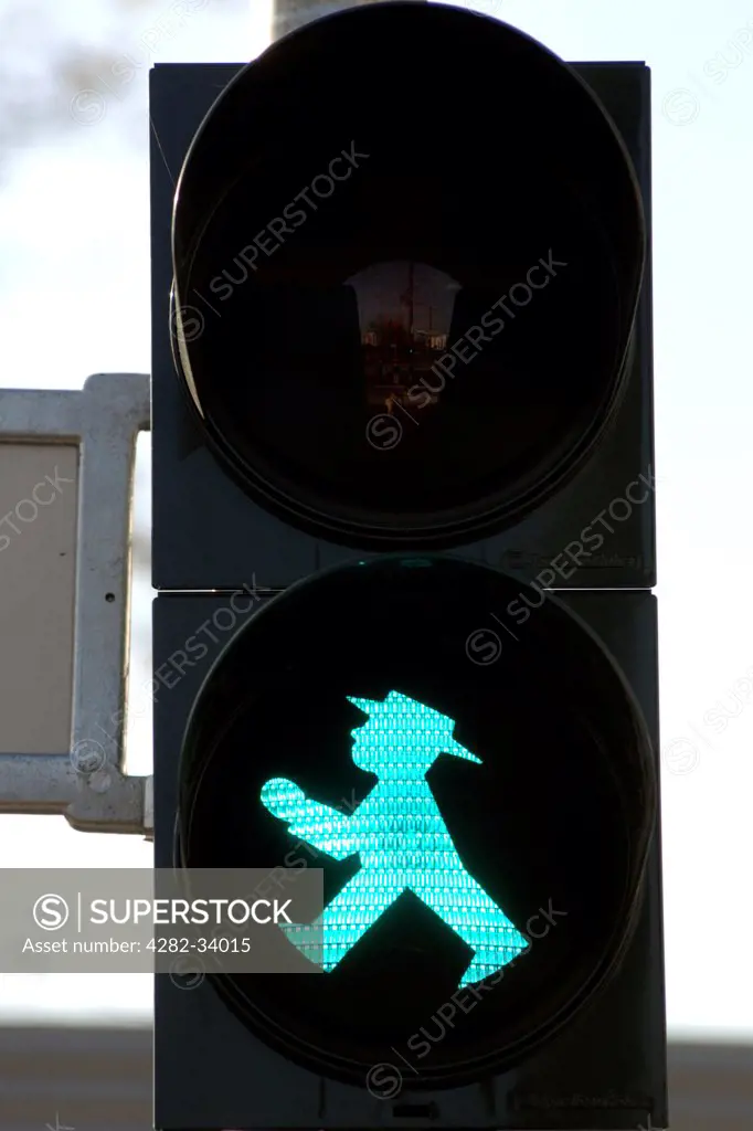 Germany, Berlin, Berlin. The unique green pedestrian traffic signal affectionately known as the Ampelmann in East Berlin.