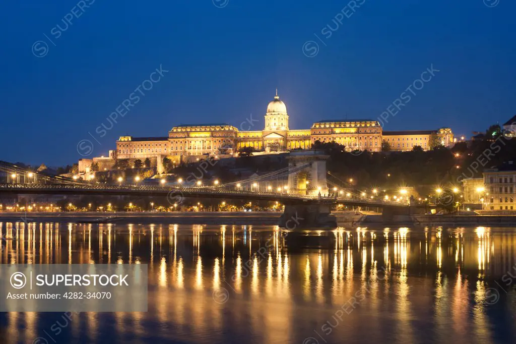 Hungary, Central Hungary, Budapest. A dawn view of Buda Castle and the Szechenyi Chain Bridge over the Danube River in Budapest.
