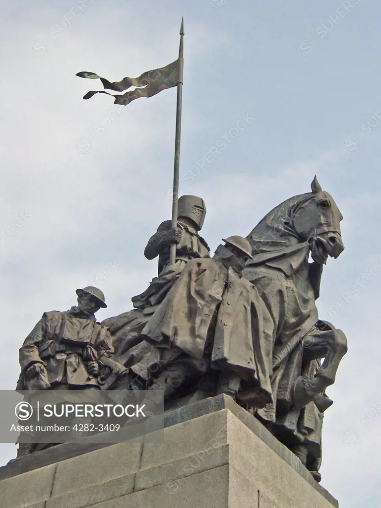 Scotland, Renfrewshire, Paisley. War Memorial with mounted crusader knight surrounded by WWI soldiers.