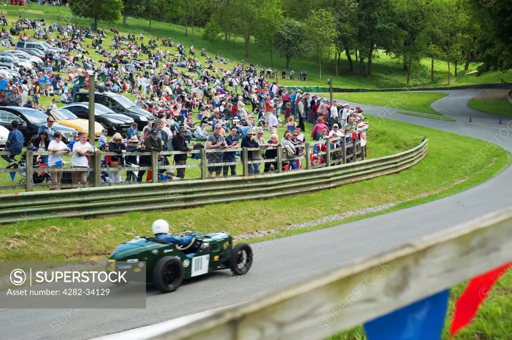 England, Gloucestershire, Prescott. Vintage cars competing at a hill climb event at Prescott.