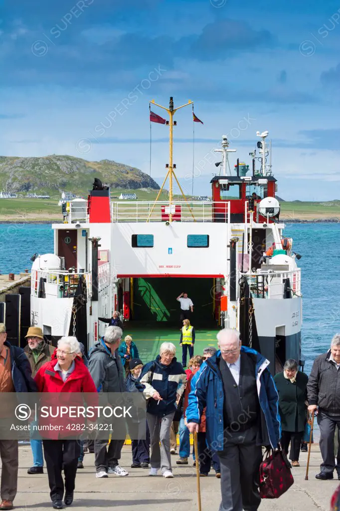 Scotland, Isle of Mull, Fionnphort. Passengers disembark the Fionnphort to Iona ferry.