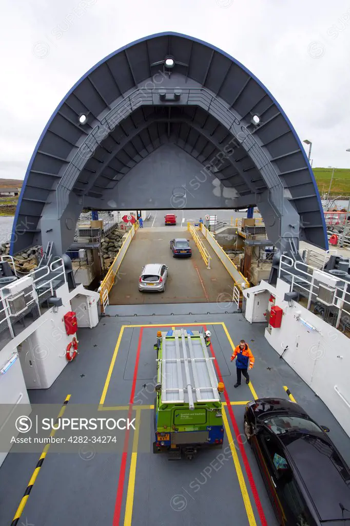 Scotland, Shetland Islands, Toft. Unloading inter island ro ro car ferry.
