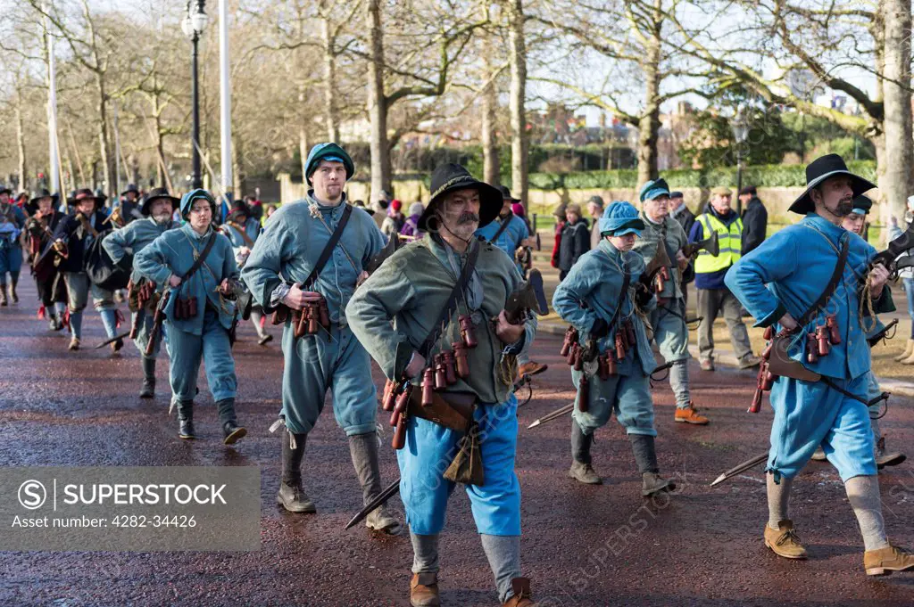 England, London, The Mall. English Civil War Society enthusiasts march down The Mall to attend a service to commemorate the execution of King Charles I.