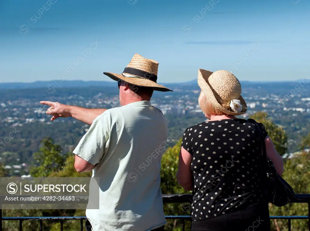 Australia, Queensland, Brisbane. Tourists on the summit of Mt Coot-Tha overlooking the City of Brisbane.