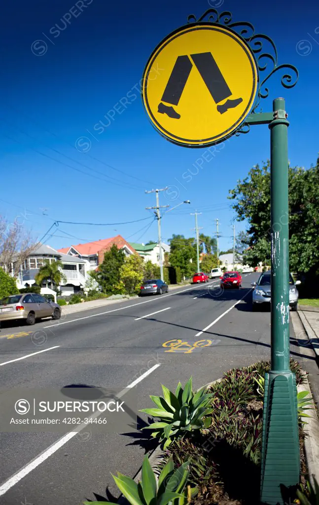 Australia, Queensland, Brisbane. A sign for a pedestrian crossing in Brisbane in Queensland.