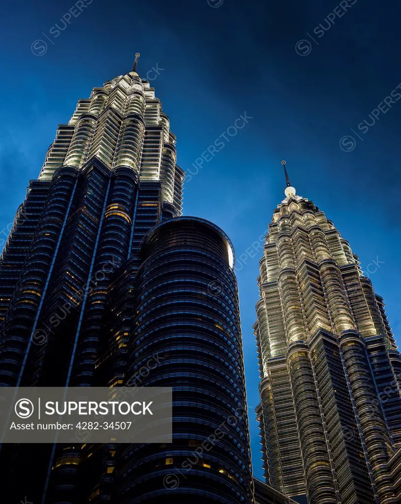 Malaysia, Federal Territory of Kuala Lumpu, Kuala Lumpur. The Petronas Towers at night in Kuala Lumpur.