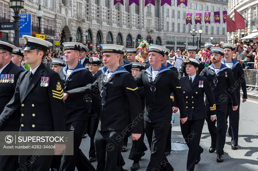 England, London, Regent Street. A contingent of the Royal Navy marching proudly down Regent Street as part of the London Pride parade.