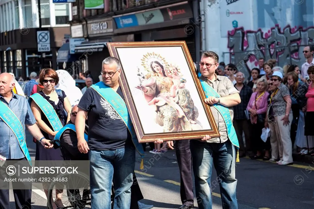 England, London, Clerkenwell. The Procession in Honour of Our Lady of Mount Carmel makes its way along Clerkenwell Road.
