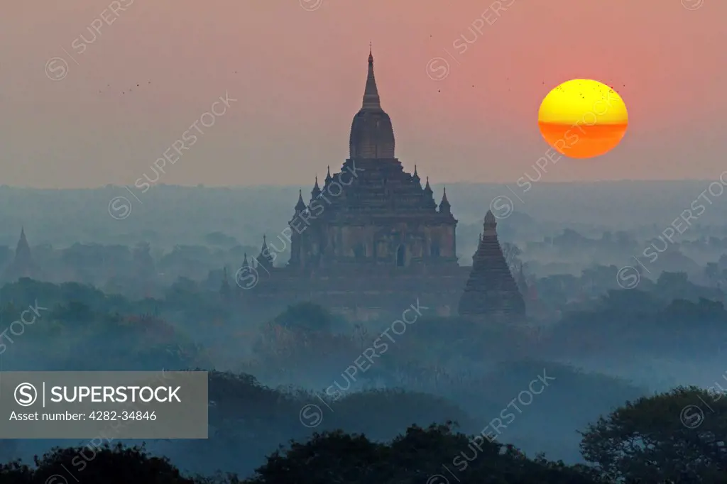 Myanmar, Mandalay, Bagan. Sunrise over the pagodas of Bagan in Myanmar.