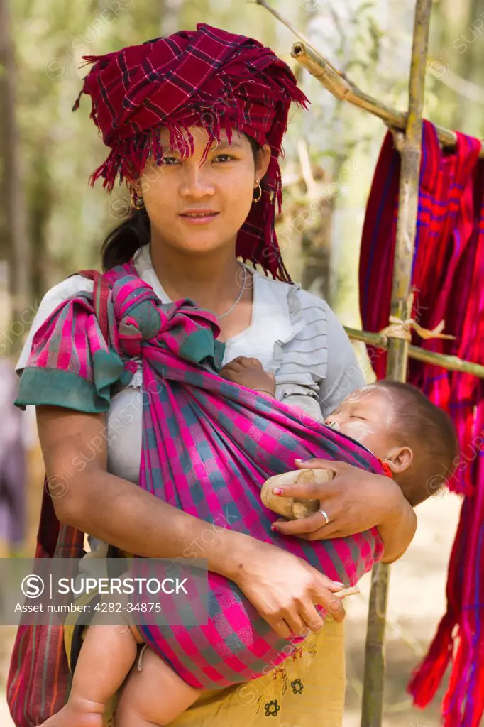 Myanmar, Shan, Shwe Inn Thein. A mother and child in Inn Thein Village in Myanmar.