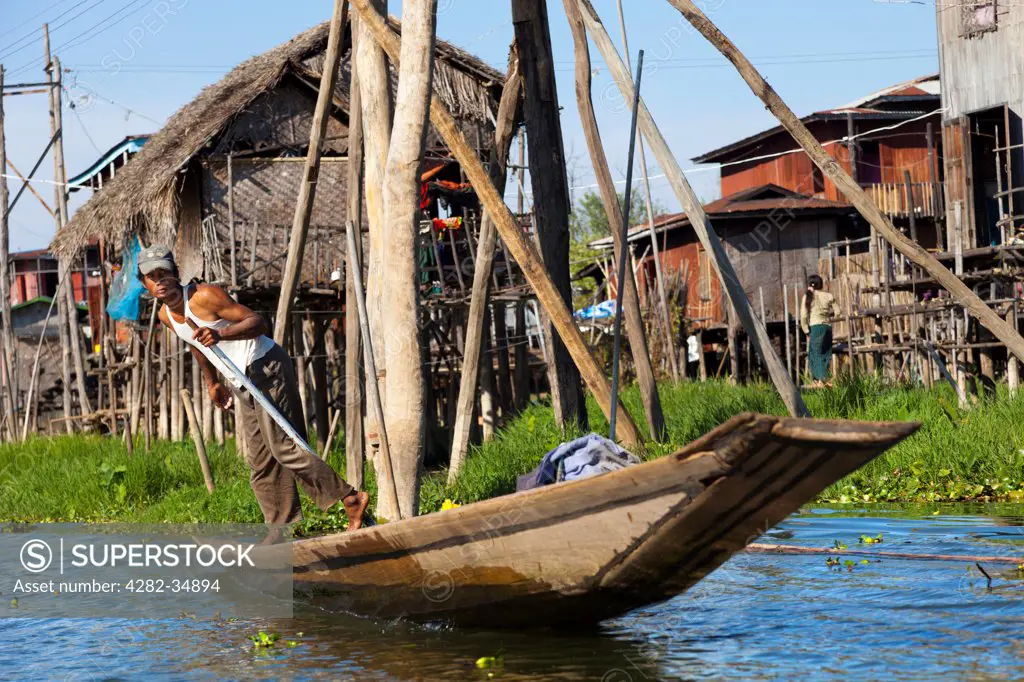 Myanmar, Shan, Lake Inle. A leg rower of Lake Inle in Myanmar.