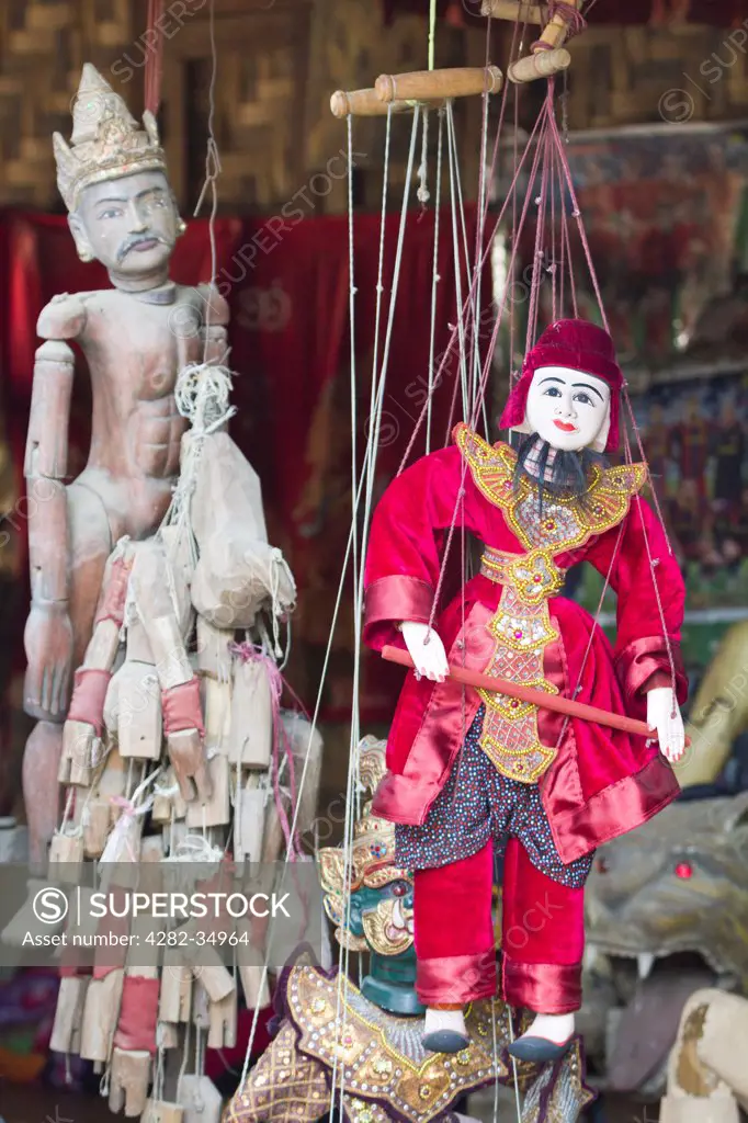 Myanmar, Mandalay, Mandalay. Burmese marionettes in a puppet maker store in Mandalay in Myanmar.