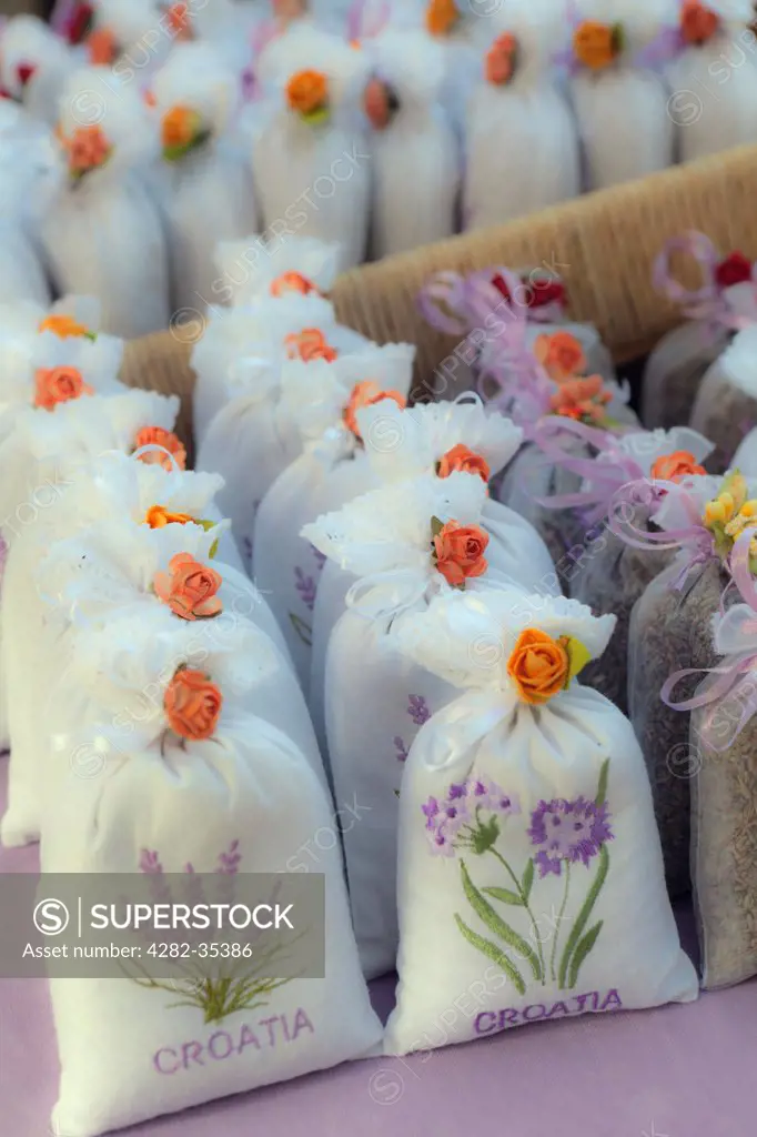 Croatia, Dalmatia, Rovinj. Lavender bags on display on a market stall in Rovinj.