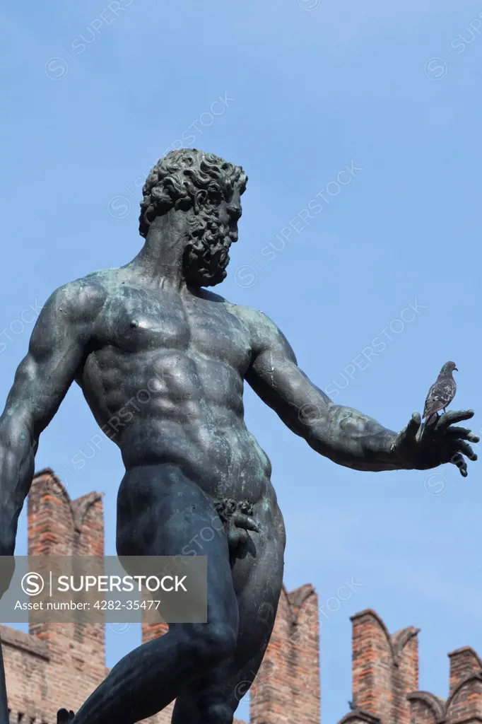 Italy, Emilia-Romagna, Bologna. The Neptune statue in Piazza Maggiore in Bologna.
