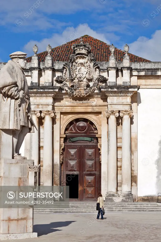 Portugal, Beira Litoral, Coimbra. The Biblioteca Joanina Library with the statue of King Joao III outside in Coimbra.
