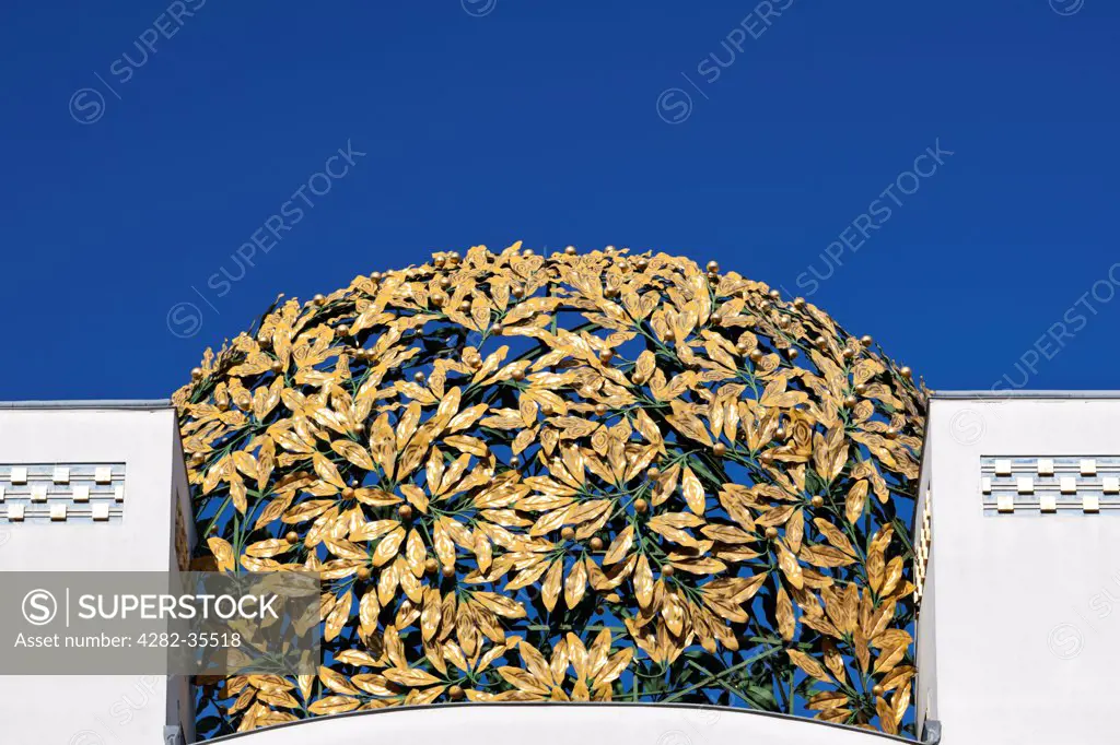 Austria, Lower Austria and Burgenland, Vienna. Detail of gold filigree cupola of the Secession building in Vienna.