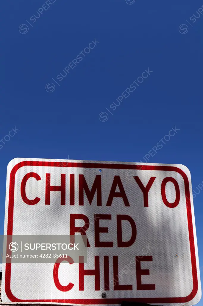 USA, New Mexico, Chimayo. Chimayo red chile sign.