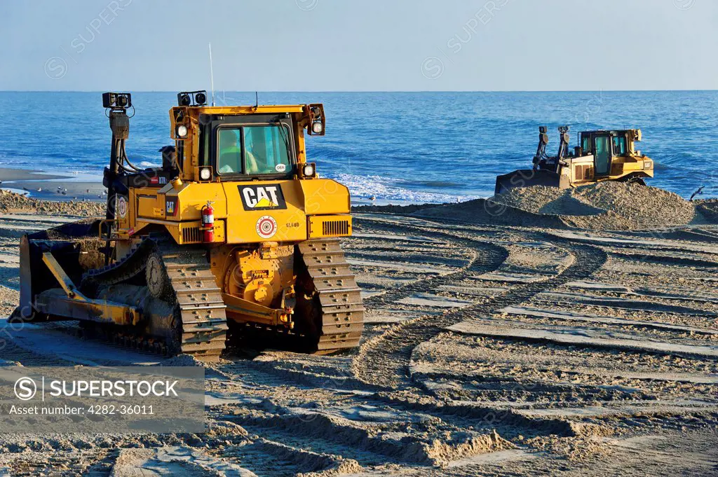 USA, North Carolina, Nags Head. Rebuilding eroded beaches at Nags Head in North Carolina.
