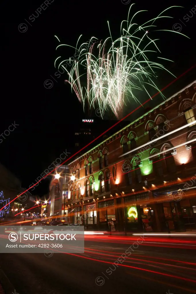 England, West Midlands, Birmingham. Fireworks over Broad Street.