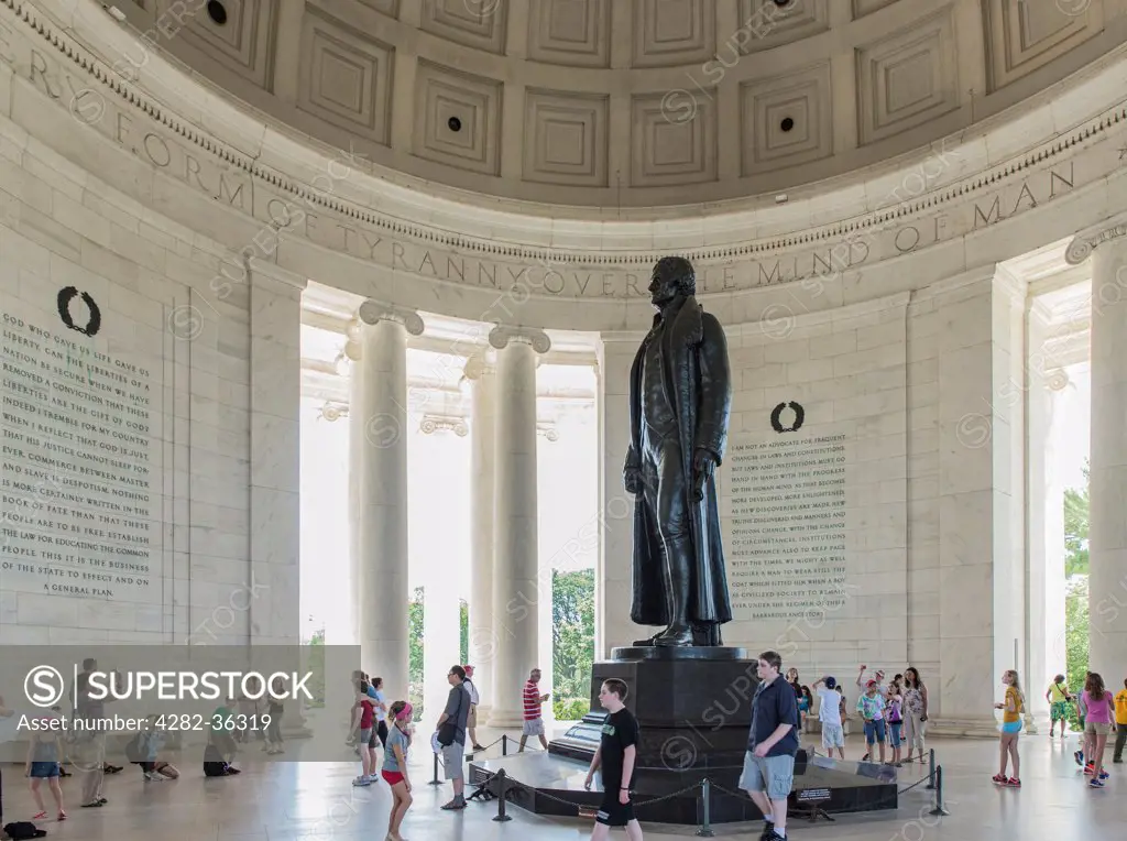 USA, District of Columbia, Washington DC. Tourists explore the Jefferson Memorial in Washington DC.