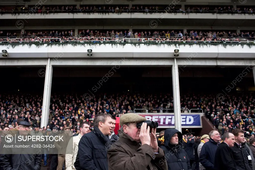 England, Gloucester, Cheltenham. The crowd at the Cheltenham Festival during the Gold Cup Day.